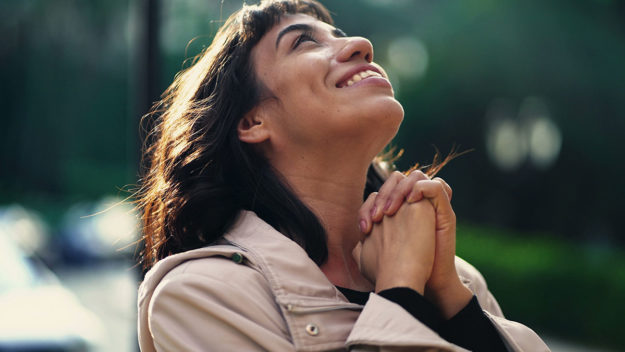 Person experiencing the benefits of being grateful