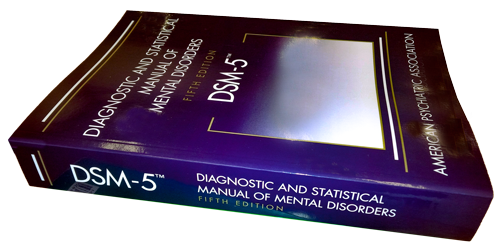 image of the Bible of mental health professionals, the Diagnostic and Statistical Manual of Mental Disorders, Fifth Edition (DSM-5),