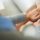 Hands of two people discussing ways to avoid rehab