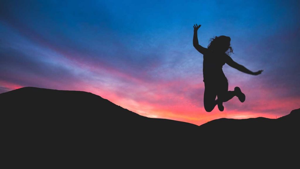 silo of person jumping in elation