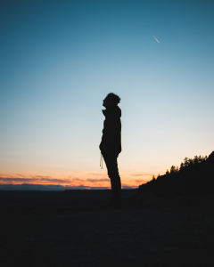 image of man with sunset in background for beyond addiction podcast