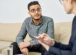 counselor explaining options to a client concerning luxury rehab for alcohol and drug treatment