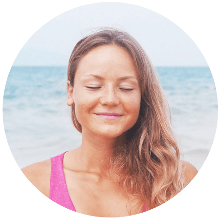 photo of a woman's smiling face in grateful meditation on the beach for a blog article entitled "5 benefits of being grateful" for Gulf Breeze Recovery a holistic non 12 step holistic drug rehab