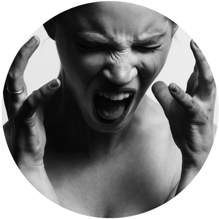 image of woman screaming for blog post entitled "Non-12 Step Rehab Ends the Revolving Door of Chronic Relapse" Gulf Breeze Recovery is a non 12 step holistic drug and alcohol rehab promoting THRIVE® Total Health Recovery, the first and only one of it's kind in the world.