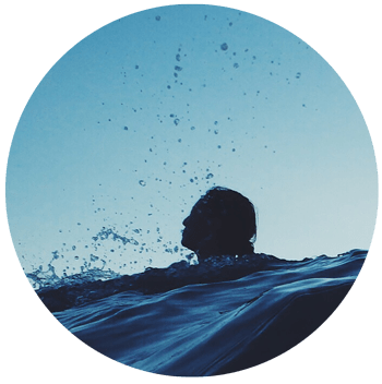 an image of person with head above water for blog article entitled "What do we lose by numbing a feeling?" for Gulf Breeze Recovery non-12 step holistic drug and alcohol rehab