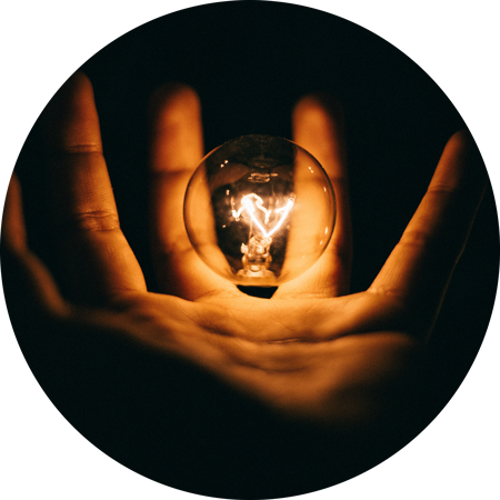 image of holding a light bulb floating in center of palm for a blog article entitled "the importance of insights" for Gulf Breeze Recovery non-12 step holistic drug and alcohol treatment facility