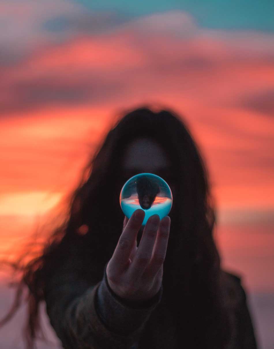 image of woman seen flipped through photo lens for a blog article entitled "What I Learned about Cravings at Gulf Breeze Recovery by a Gulf Breeze Recovery graduate" for Gulf Breeze Recovery non-12 step holistic drug and alcohol treatment facility