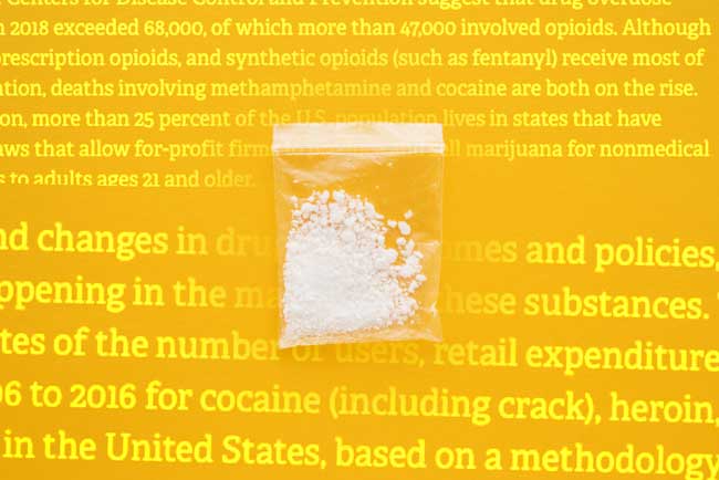 image of drugs on yellow background with copy from report that Shines Light on Nation’s Increase in Illegal Drug Spending and Chronic Users for Gulf Breeze Recovery non 12 step drug and alcohol holistic rehab