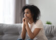 Person thinking about women and addiction