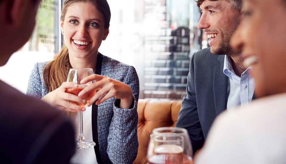 image of woman socializing with a glass of wine for Gulf Breeze recovery non 12 step holistic drug and alcohol rehab in Florida