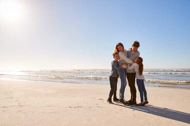 image of family on beach for Gulf Breeze Recovery Non-12 stepholistic drug and alcohol rehab in Florida