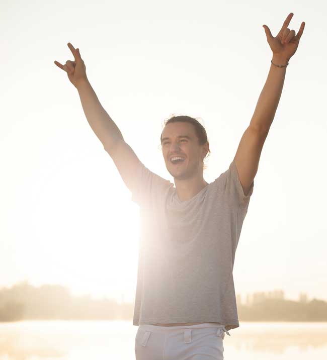 image of person with arms raised in victory for blog article for Gulf Breeze Recovery's non-12 step holistic drug and alcohol rehab in Florida