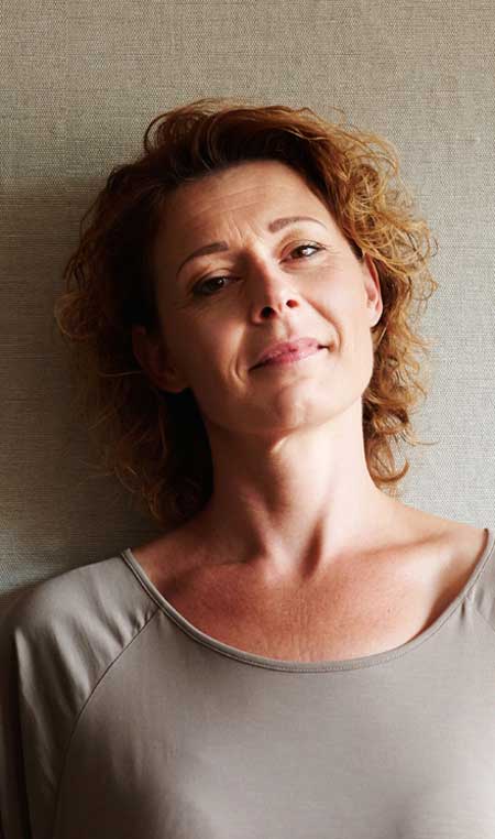 image of woman contemplating treatment for drug addiction for Gulf Breeze Recovery's non-12 step holistic alcohol and drug rehab