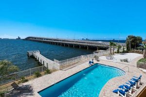 image of pool and private fishing pier at Gulf Breeze Recovery