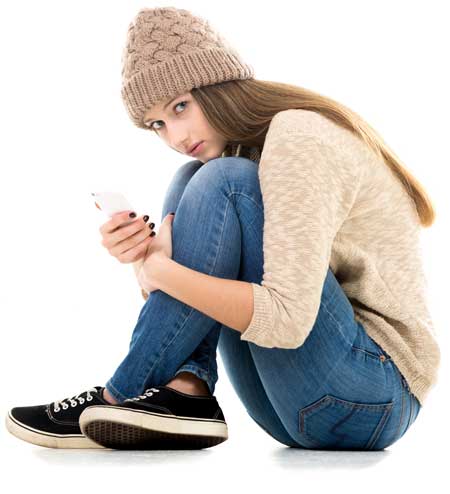 image of young girl sitting cross-legged