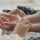 Hands of two people in holistic substance abuse treatment