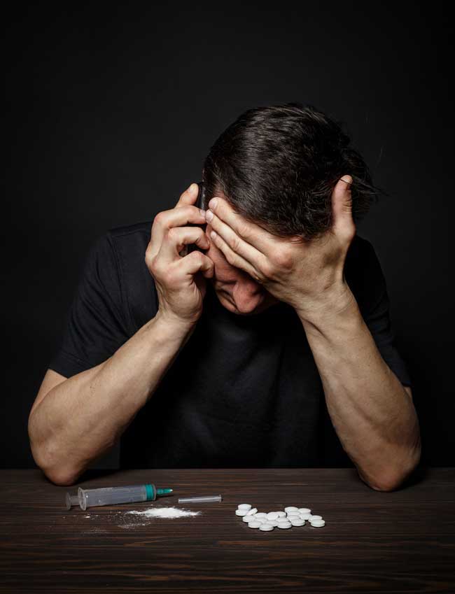 man addicted to drug calling for help