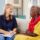 Two people talking about senior citizens and addiction