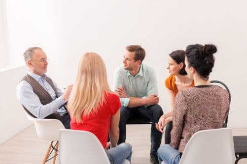 a group attends a group therapy program