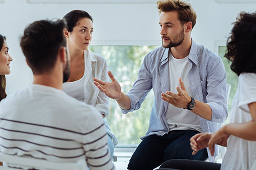 a group participates in a meth addiction treatment center