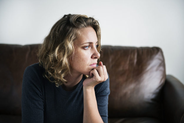 woman sitting and wondering what is molly