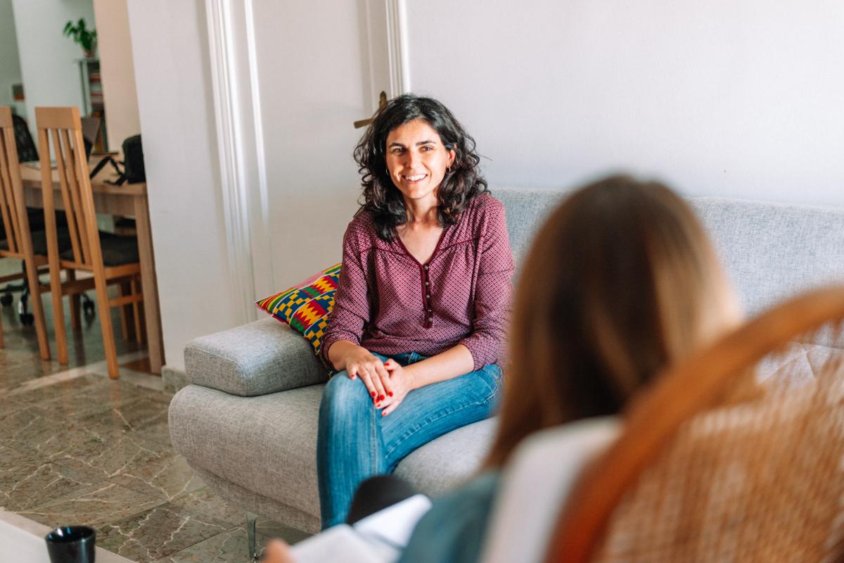 smiling person in counseling in luxury rehab in Florida