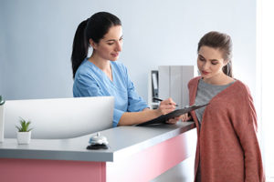 nurse checking client into a private medical detox program