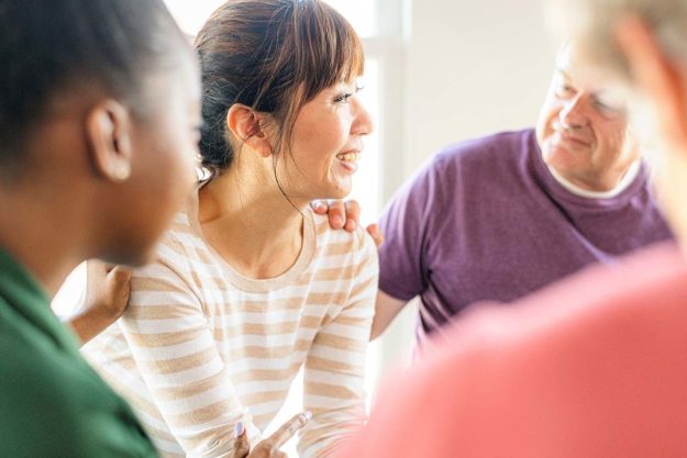 People convening at an inpatient drug rehab center