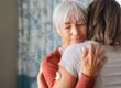 A person hugging a loved one who suggested getting heroin addiction help