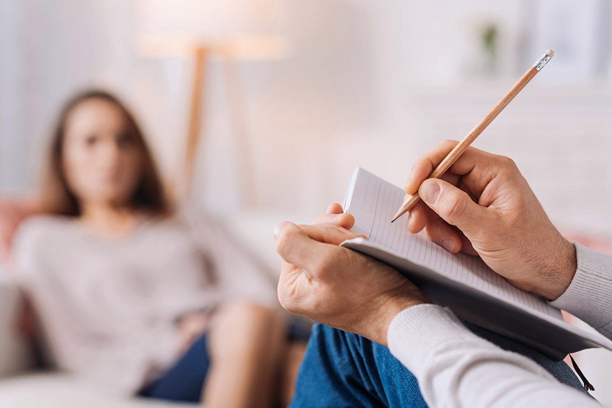 A woman learning about benefits of EMDR.
