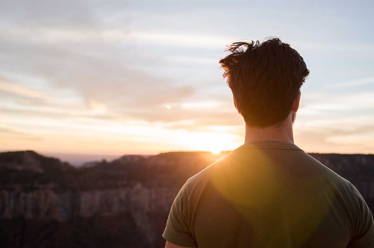 A man contemplates fentanyl recovery stories in his mind