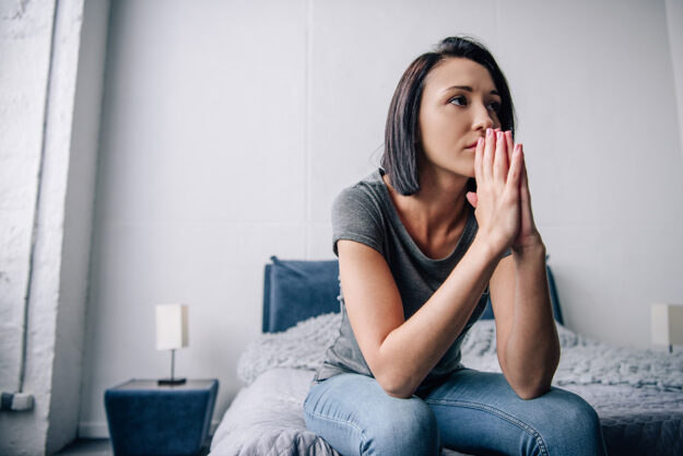 A woman experiencing signs of opioid addiction