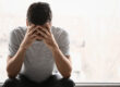 A man thinking about his signs of opioid intoxication