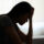 A woman thinking about the Florida opioid crisis