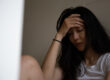 A woman wondering, "Are opioids illegal in Florida?"