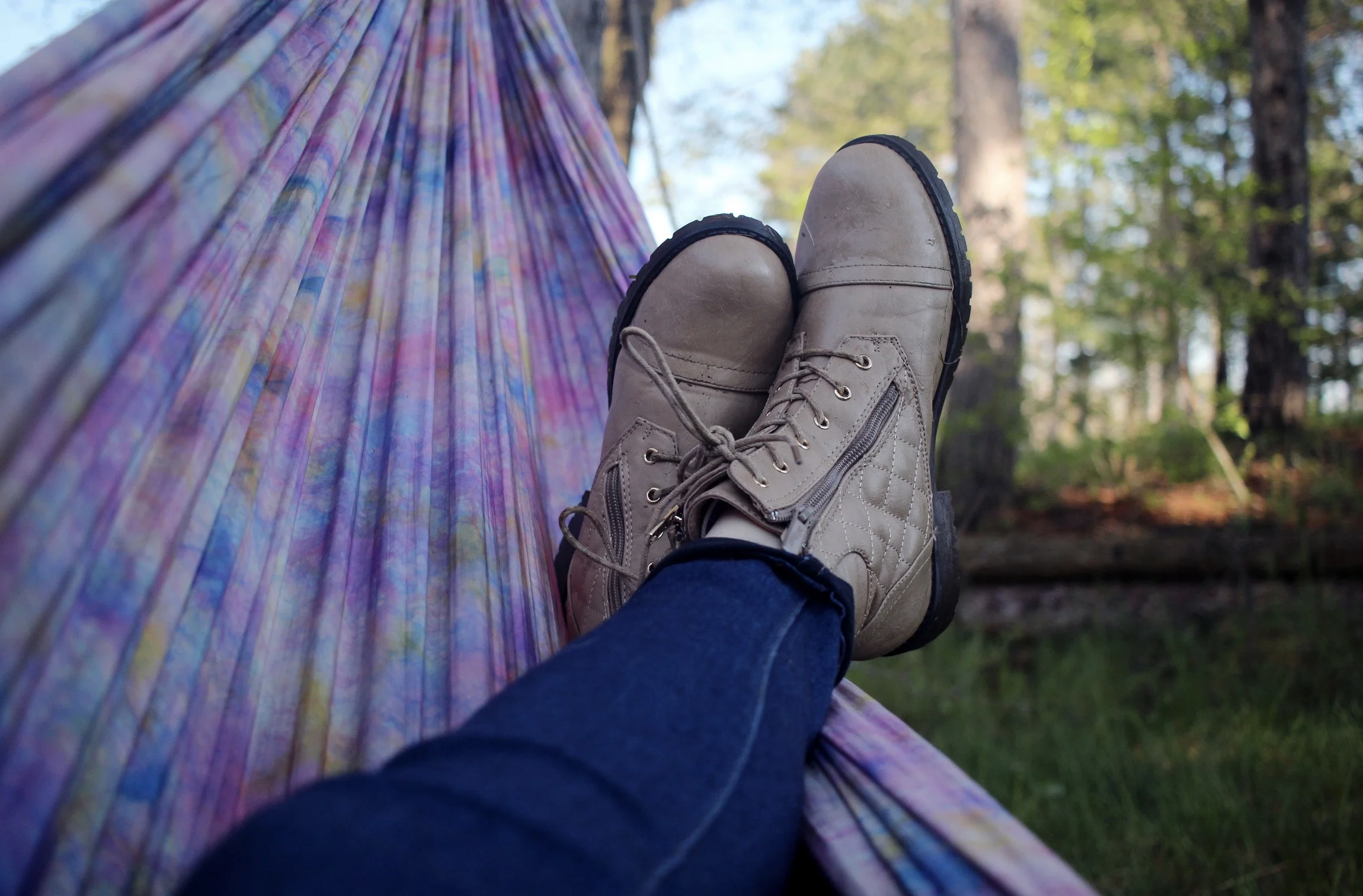 image of person laying in a hammock