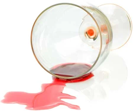 image of spilled from knocked over wine glass for for Gulf Breeze Recpvery non 12 step holistic drug and alcohol rehab blog post article on alcohol use and sleep cycles