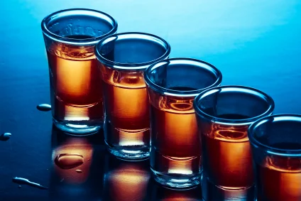 image of shots of alcohol for a blog article on excessive alcohol consumption for Gulf Breeze Recovery non 12 step holistic drug and alcohol rehab facility in florida