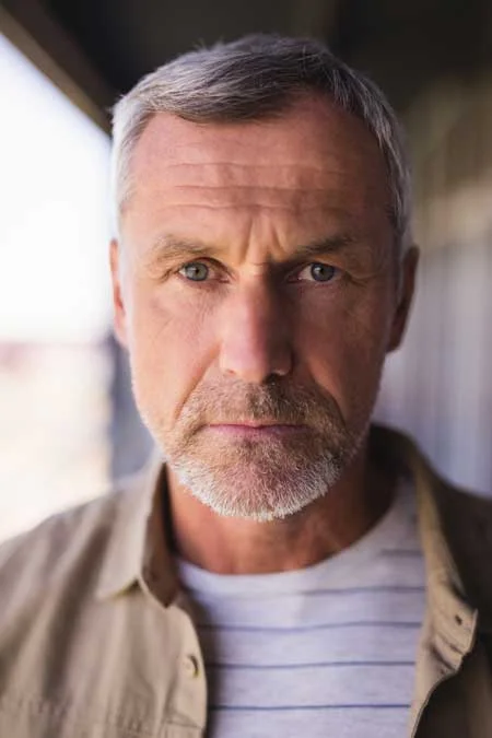 image of serious man facing camera