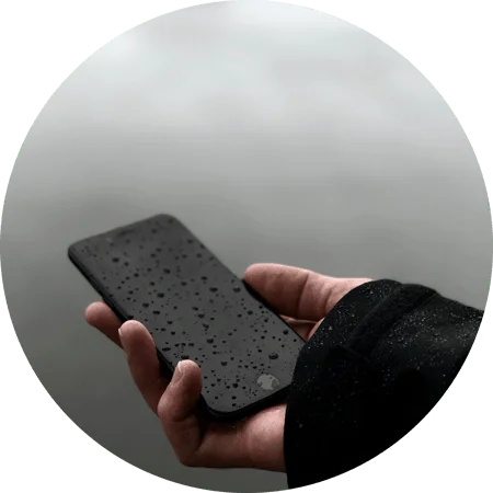 image of woman holding a blank cell phone for a blog article entitled "What I Learned about Cravings at Gulf Breeze Recovery by a Gulf Breeze Recovery graduate" for Gulf Breeze Recovery non-12 step holistic drug and alcohol treatment facility