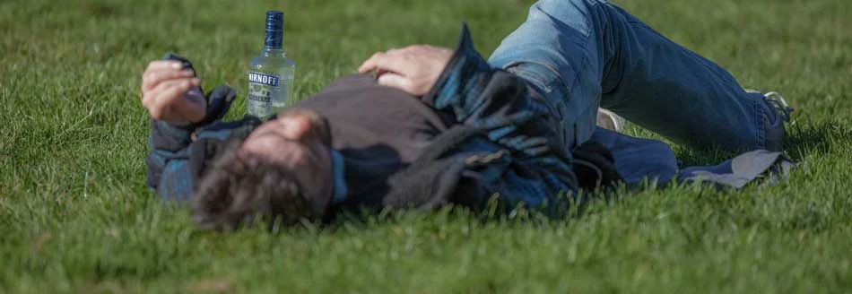 image of passed out drunk guy for blog article entitled 