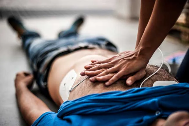 image of man being resuscitated after opioid overdose for Gulf Breeze Recovery non 12 step holistic drug and alcohol rehab