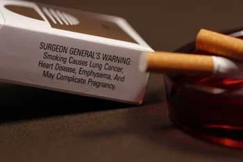 The Rush to Legalize Marijuana image of pack of cigarettes w surgeon general health warning visible for Gulf Breeze Recovery non-12 step holistic drug and alcohol rehab program THRIVE® Total Health Recovery