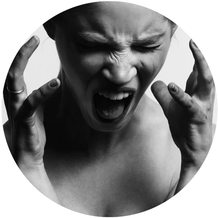image of woman screaming for blog post entitled "Non-12 Step Rehab Ends the Revolving Door of Chronic Relapse" Gulf Breeze Recovery is a non 12 step holistic drug and alcohol rehab promoting THRIVE® Total Health Recovery, the first and only one of it's kind in the world.