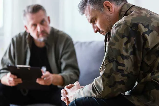two men discussing trauma and depression