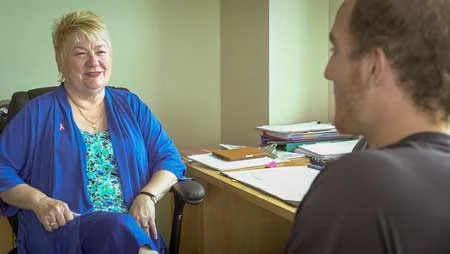 image of man in therapy for blog article entitled "Stairway to Rock-Bottom" for Gulf Breeze Recovery, a non-12 step holistic drug and alcohol rehab