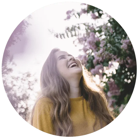 happy young woma in nature for Given the advances in brain science, psychology, and our understanding of addiction, treatment should be based on empowerment