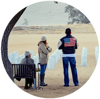 image of multi generations of veterans at memorial cemetery for gulf breeze recovery article on "Half a Million U.S. Vets Addicted to Opiates" Gulf Breeze Recovery is a non 12 step holistic drug and alcohol treatment facility that uses the THRIVE® Total Health Recovery Model for recovery