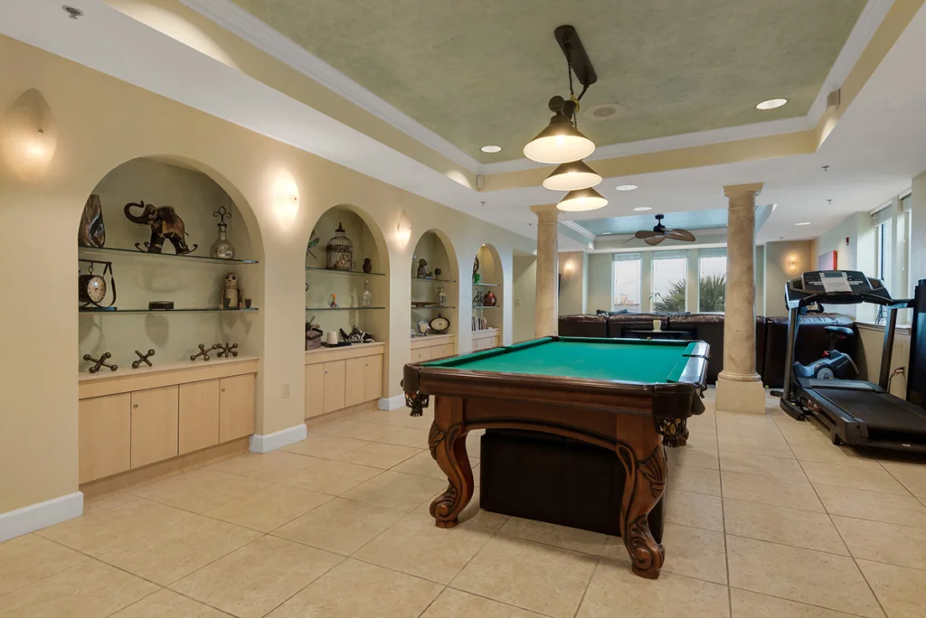 Pool table inside well lit room