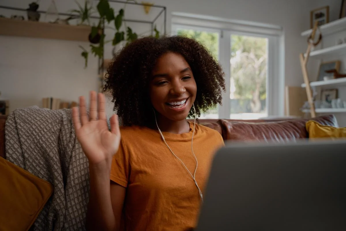 A woman experiencing the benefits of telehealth